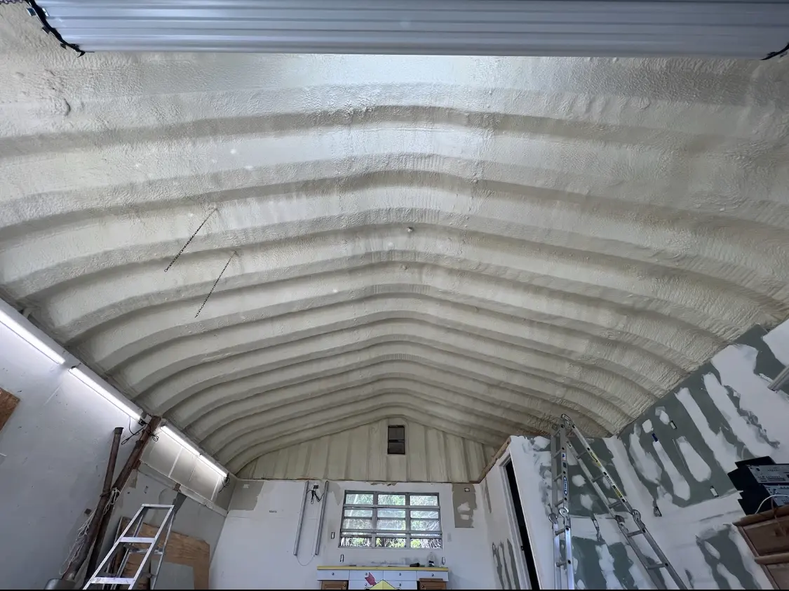 Spray polyurethane foam applied to the underside of a metal roof deck in Lake Stickney